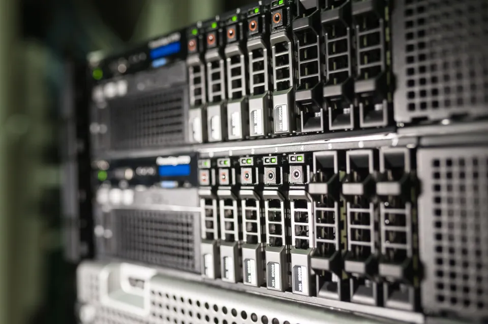 Server equipment in a business office representing systems connected to cloud applications.